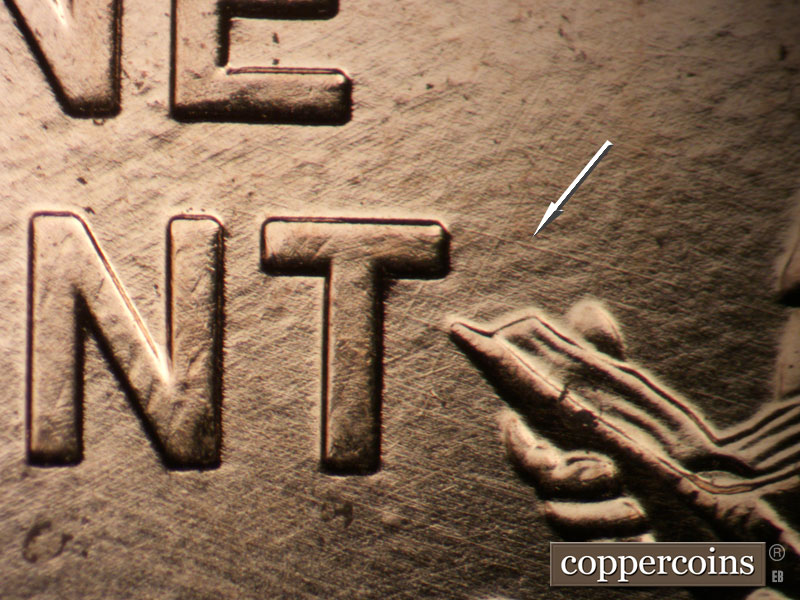 Die-stage A marker on 2009P•1DR•093 (2009 Doubled Die Reverse).