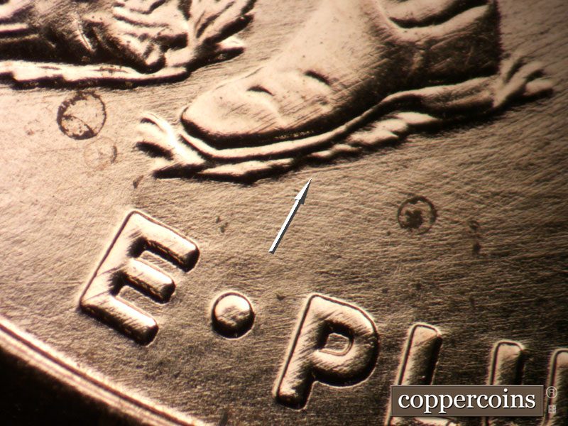 Die-stage A marker on 2009P•1DR•093 (2009 Doubled Die Reverse).