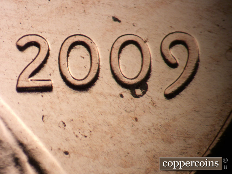 Die-stage A marker on 2009P•1DR•093 (2009 Doubled Die Reverse).