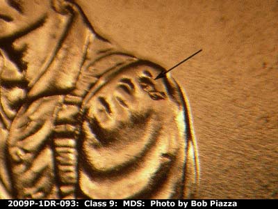 Die-stage B marker on 2009P•1DR•093 (2009 Doubled Die Reverse).