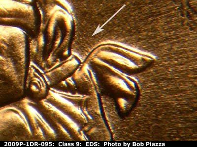 Die-stage A marker on 2009P•1DR•095 (2009 Doubled Die Reverse).