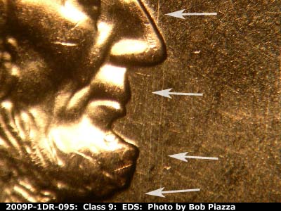 Die-stage A marker on 2009P•1DR•095 (2009 Doubled Die Reverse).
