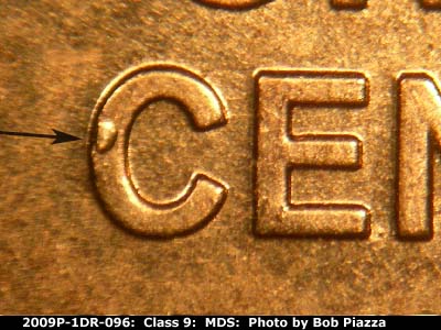Die-stage B marker on 2009P•1DR•096 (2009 Doubled Die Reverse).