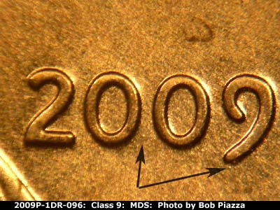 Die-stage B marker on 2009P•1DR•096 (2009 Doubled Die Reverse).