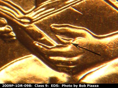 Die-stage A marker on 2009P•1DR•098 (2009 Doubled Die Reverse).