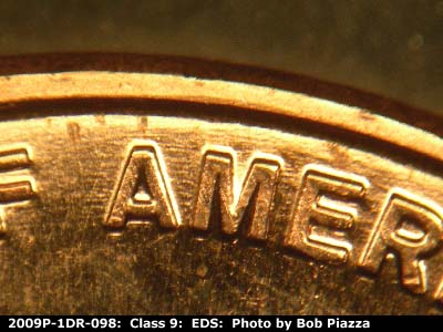 Die-stage A marker on 2009P•1DR•098 (2009 Doubled Die Reverse).
