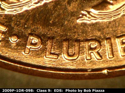 Die-stage A marker on 2009P•1DR•098 (2009 Doubled Die Reverse).