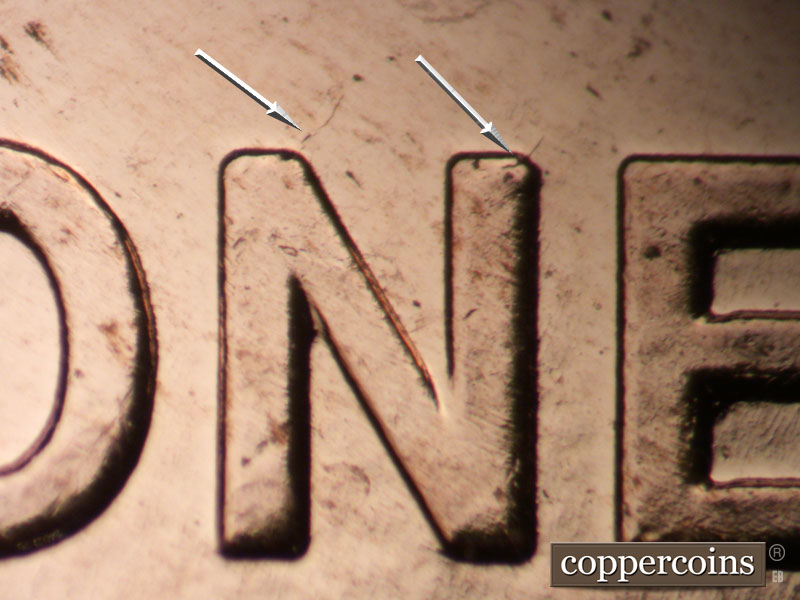 Die-stage B marker on 2009P•1DR•100 (2009 Doubled Die Reverse).