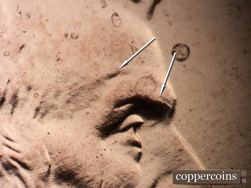 Die-stage B marker on 2009P•1DR•100 (2009 Doubled Die Reverse).