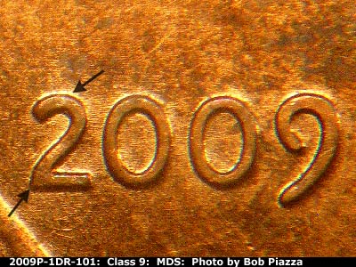 Die-stage B marker on 2009P•1DR•101 (2009 Doubled Die Reverse).