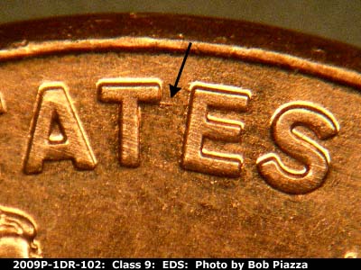 Die-stage A marker on 2009P•1DR•102 (2009 Doubled Die Reverse).