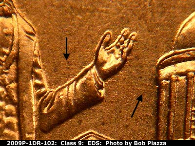 Die-stage A marker on 2009P•1DR•102 (2009 Doubled Die Reverse).
