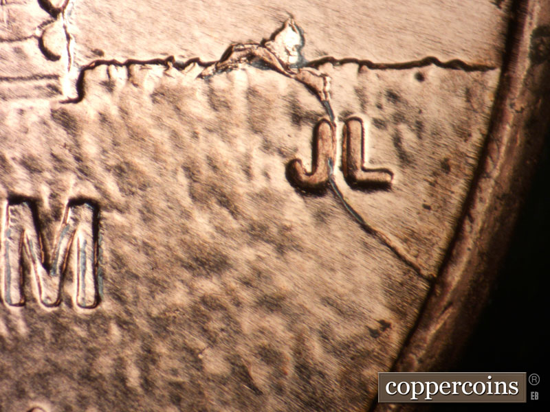 Die-stage B marker on 2009P•1DR•104 (2009 Doubled Die Reverse).