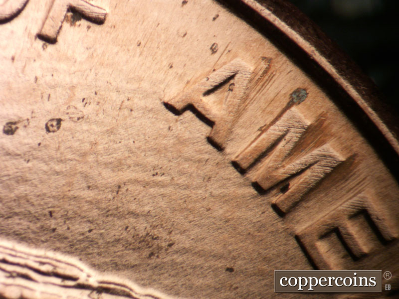 Die-stage B marker on 2009P•1DR•105 (2009 Doubled Die Reverse).