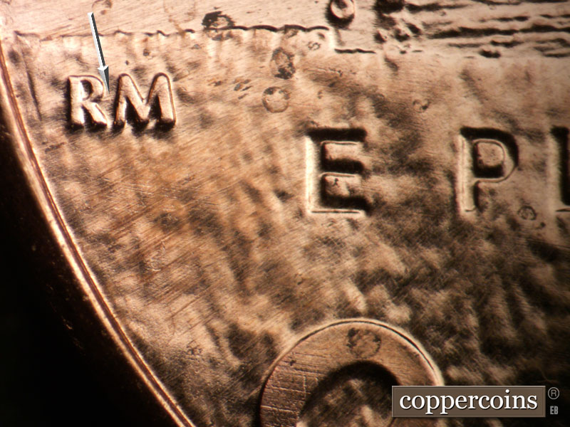 Die-stage B marker on 2009P•1DR•105 (2009 Doubled Die Reverse).