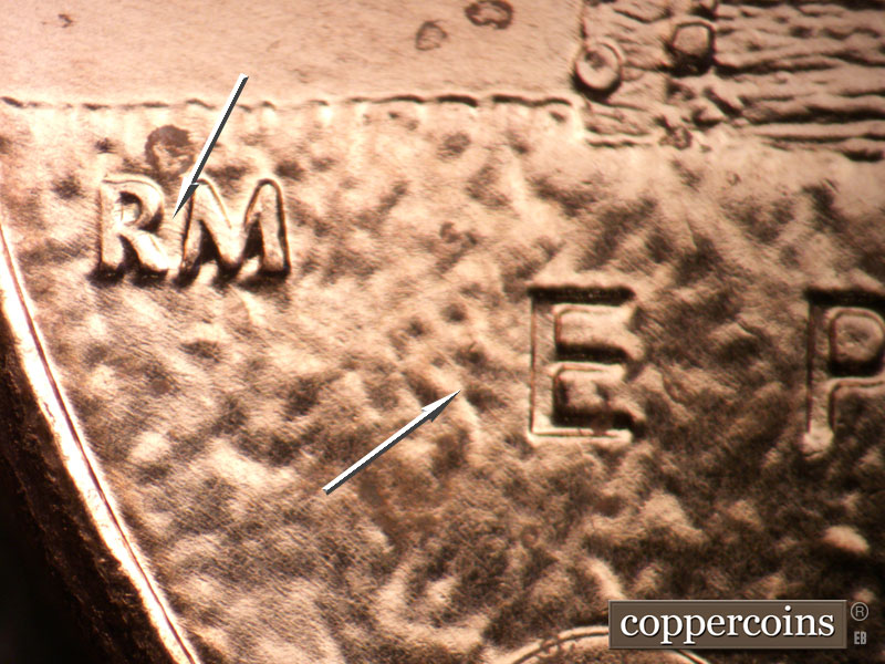 Die-stage A marker on 2009P•1DR•106 (2009 Doubled Die Reverse).