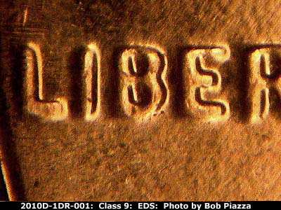 Die-stage A marker on 2010D•1DO•001 (2010 Doubled Die Obverse).