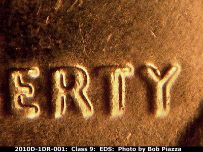 Die-stage A marker on 2010D•1DO•001 (2010 Doubled Die Obverse).
