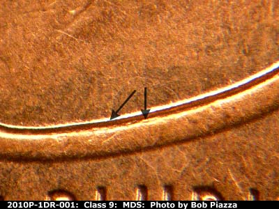 Die-stage B marker on 2010P•1DR•001 (2010 Doubled Die Reverse).