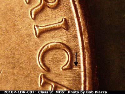 Die-stage B marker on 2010P•1DR•002 (2010 Doubled Die Reverse).