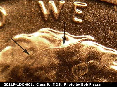 Die-stage B marker on 2011P•1DO•001 (2011 Doubled Die Obverse).