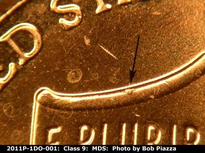 Die-stage B marker on 2011P•1DO•001 (2011 Doubled Die Obverse).