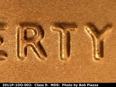 Die-stage B marker on 2011P•1DO•002 (2011 Doubled Die Obverse).