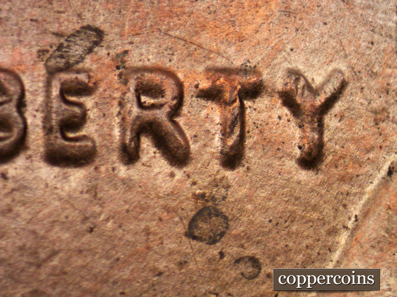 Die-stage B marker on 2011P•1DO•004 (2011 Doubled Die Obverse).