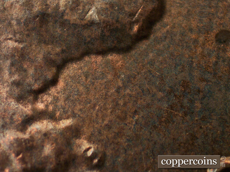 Die-stage A marker on 2011P•1DR•002 (2011 Doubled Die Reverse).