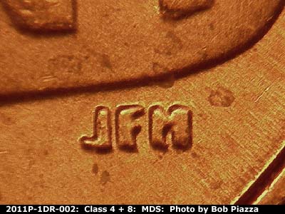 Die-stage B marker on 2011P•1DR•002 (2011 Doubled Die Reverse).