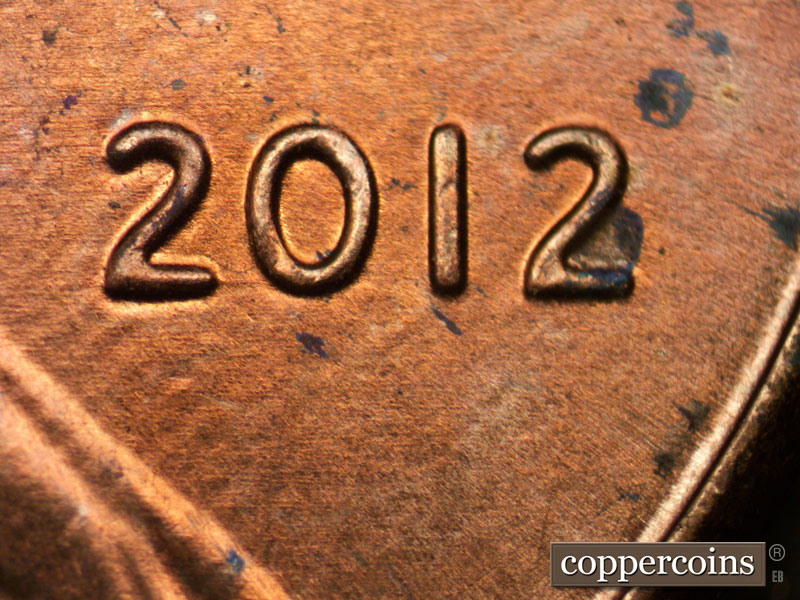 Die-stage C marker on 2012P•1DO•002 (2012 Doubled Die Obverse).