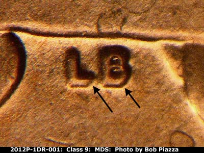 Die-stage B marker on 2012P•1DR•001 (2012 Doubled Die Reverse).