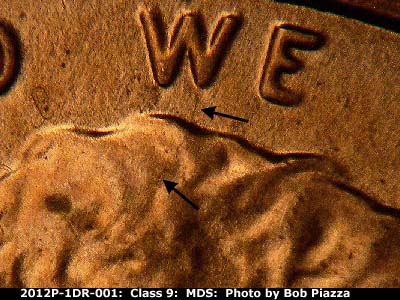 Die-stage B marker on 2012P•1DR•001 (2012 Doubled Die Reverse).
