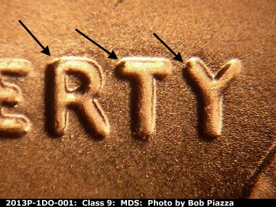 Die-stage B marker on 2013P•1DO•001 (2013 Doubled Die Obverse).