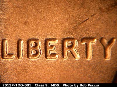 Die-stage B marker on 2013P•1DO•001 (2013 Doubled Die Obverse).