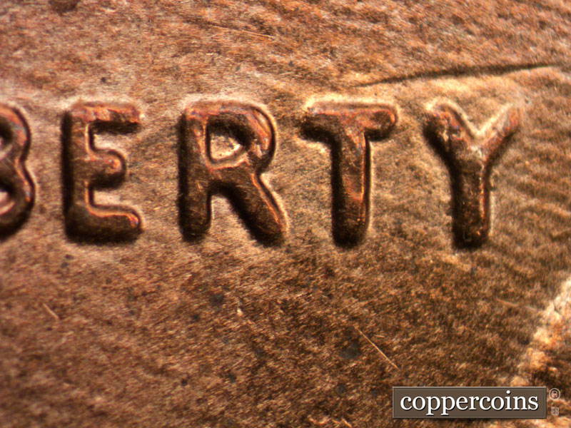 Die-stage B marker on 2013P•1DO•002 (2013 Doubled Die Obverse).