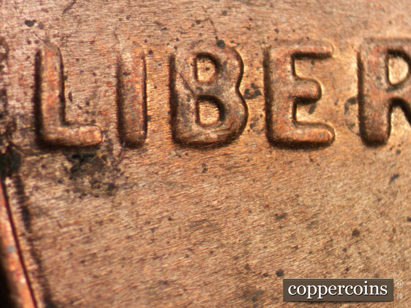 Die-stage B marker on 2013P•1DO•005 (2013 Doubled Die Obverse).