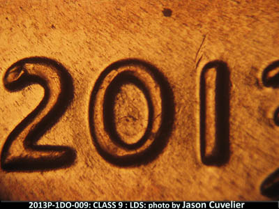 Die-stage C marker on 2013P•1DO•009 (2013 Doubled Die Obverse).