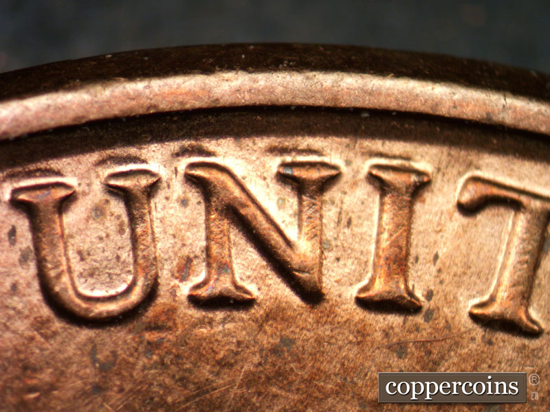 Die-stage B marker on 2013P•1DR•001 (2013 Doubled Die Reverse).