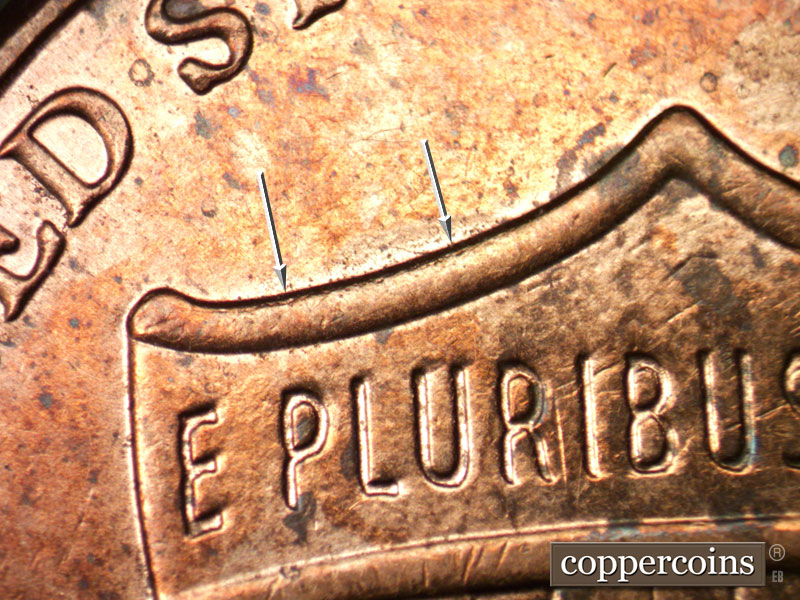 Die-stage B marker on 2013P•1DR•001 (2013 Doubled Die Reverse).