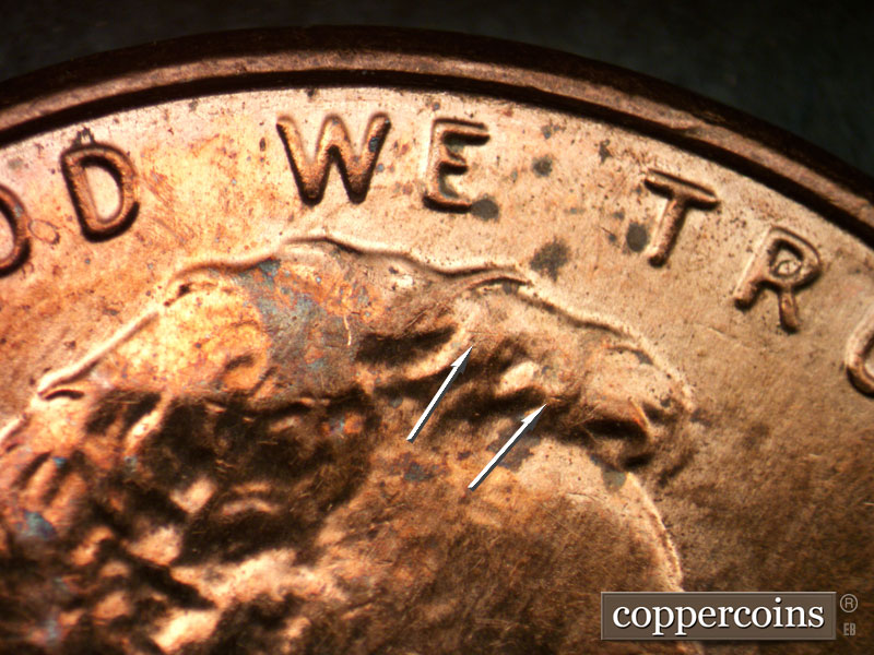 Die-stage B marker on 2013P•1DR•001 (2013 Doubled Die Reverse).