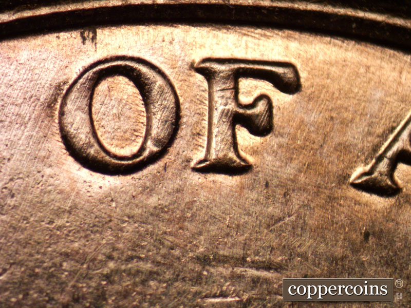 Die-stage B marker on 2013P•1DR•002 (2013 Doubled Die Reverse).