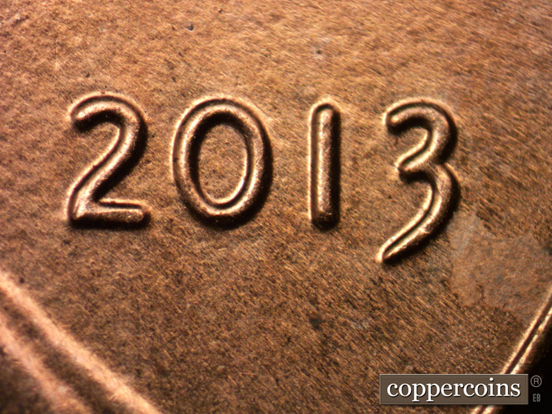 Die-stage B marker on 2013P•1DR•002 (2013 Doubled Die Reverse).