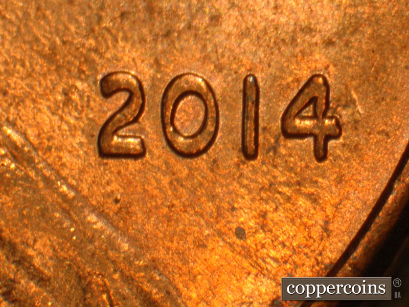 Die-stage B marker on 2014P•1DO•001 (2014 Doubled Die Obverse).