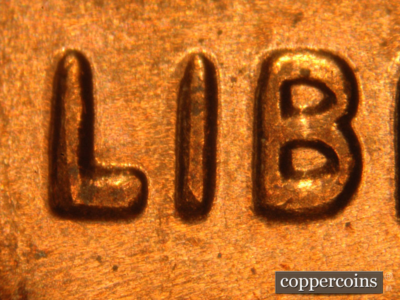 Die-stage B marker on 2014P•1DO•001 (2014 Doubled Die Obverse).