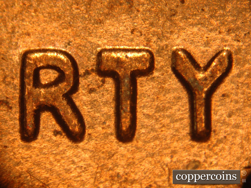 Die-stage B marker on 2014P•1DO•001 (2014 Doubled Die Obverse).