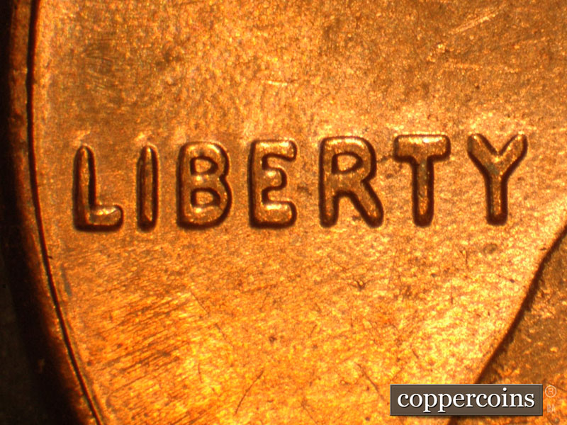 Die-stage B marker on 2014P•1DO•001 (2014 Doubled Die Obverse).