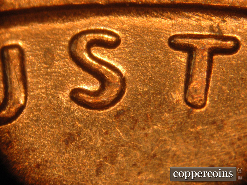 Die-stage B marker on 2014P•1DO•001 (2014 Doubled Die Obverse).