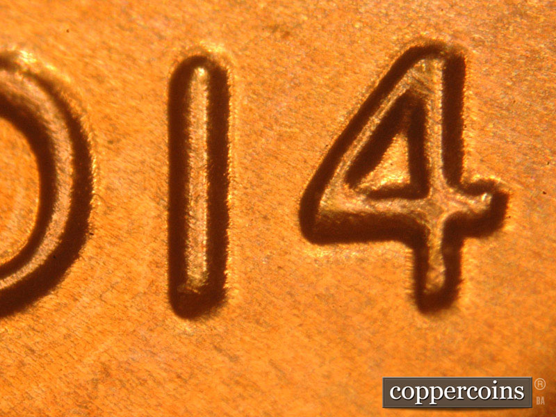 Die-stage B marker on 2014P•1DO•002 (2014 Doubled Die Obverse).