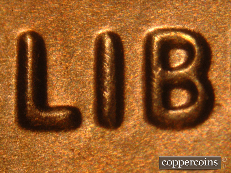 Die-stage B marker on 2014P•1DO•002 (2014 Doubled Die Obverse).